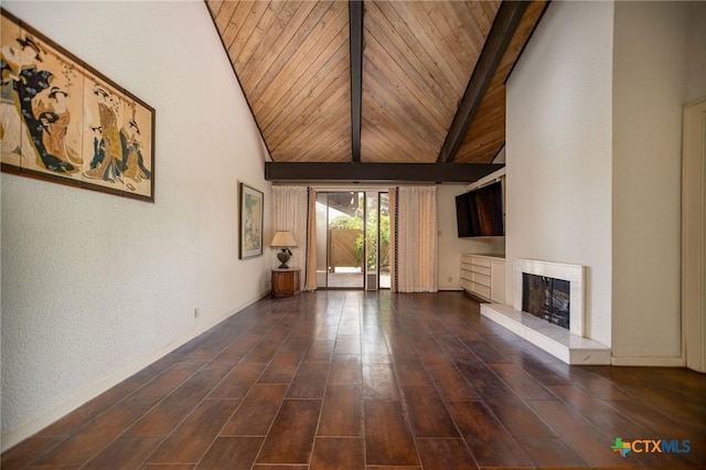 1809 W Harrison Ave, Port Oconnor, TX 77982 - unfurnished living room featuring a wood ceiling with exposed beams, high vaulted ceiling, wood finished floors, and a premium fireplace