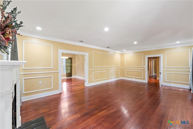 unfurnished living room featuring dark hardwood / wood-style floors and ornamental molding