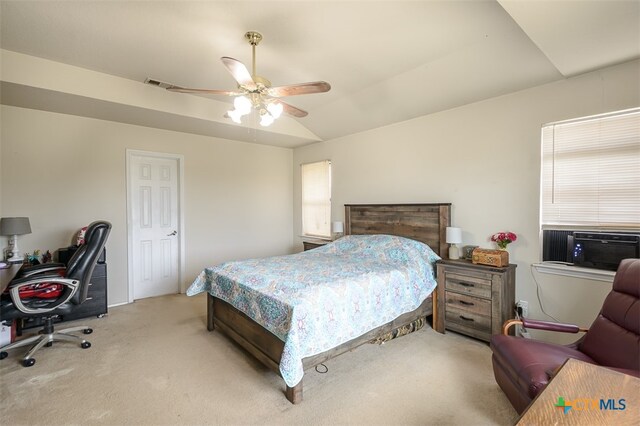 bedroom with light colored carpet, cooling unit, and ceiling fan