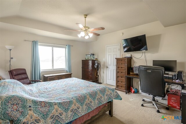 bedroom featuring ceiling fan and carpet floors