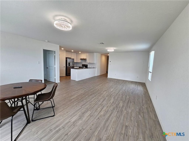 living room featuring light wood-type flooring