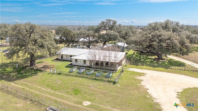 birds eye view of property with a rural view