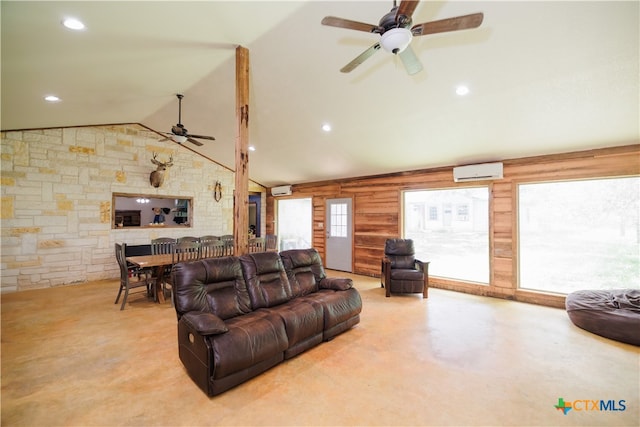 living room with lofted ceiling, a wall mounted air conditioner, and ceiling fan