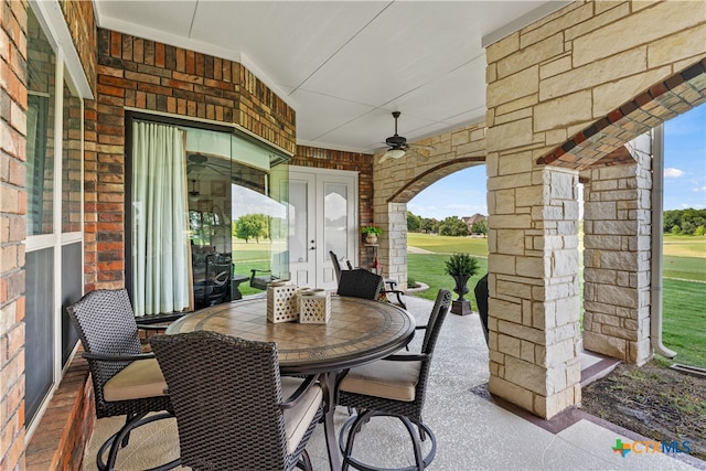 view of patio / terrace featuring ceiling fan