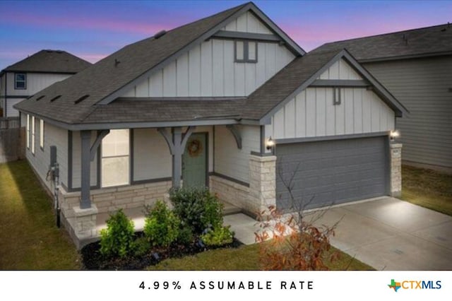 view of front of home with a garage