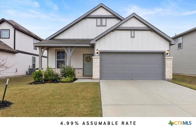 view of front of property featuring a garage, central AC, a front lawn, and covered porch