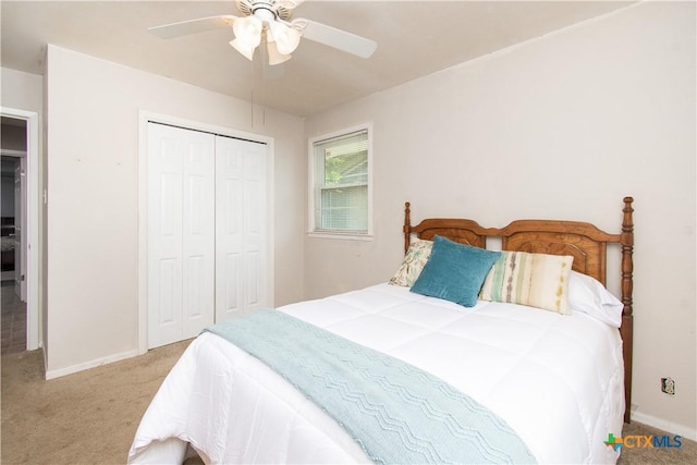 4512 Briar Cliff Rd, Temple, TX 76502 - carpeted bedroom featuring a closet, baseboards, and a ceiling fan