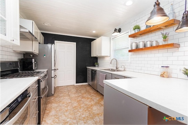 4512 Briar Cliff Rd, Temple, TX 76502 - kitchen with appliances with stainless steel finishes, a sink, light countertops, white cabinets, and recessed lighting