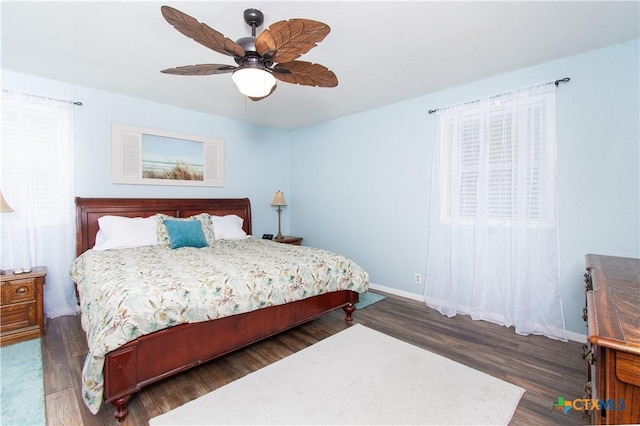 4512 Briar Cliff Rd, Temple, TX 76502 - bedroom with dark wood-style flooring, baseboards, and a ceiling fan