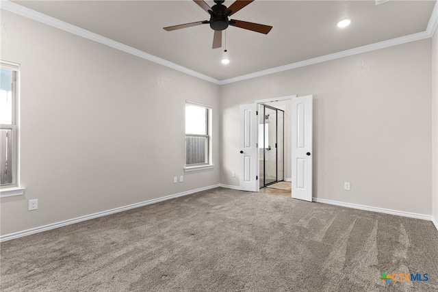 unfurnished bedroom with baseboards, ornamental molding, and carpet flooring