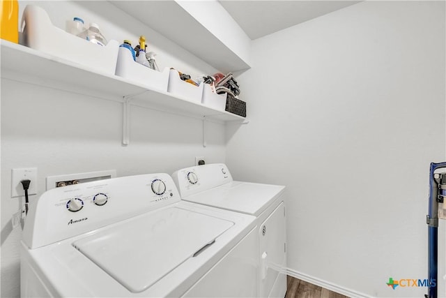 2026 Bee Creek Loop, Copperas Cove, TX 76522 - laundry room with separate washer and dryer, wood finished floors, and baseboards