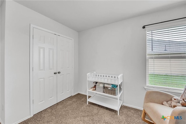 2026 Bee Creek Loop, Copperas Cove, TX 76522 - carpeted bedroom with multiple windows, a closet, and baseboards