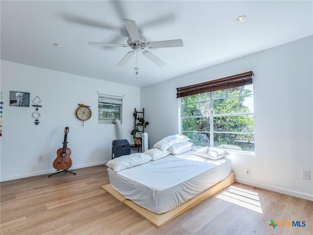1000 Advance St, San Marcos, TX 78666 - bedroom with recessed lighting, light wood-type flooring, baseboards, and ceiling fan