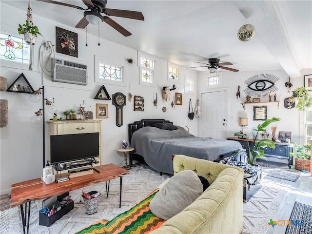 1000 Advance St, San Marcos, TX 78666 - bedroom with an AC wall unit and ceiling fan