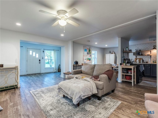 1000 Advance St, San Marcos, TX 78666 - living room with recessed lighting, a ceiling fan, and wood finished floors