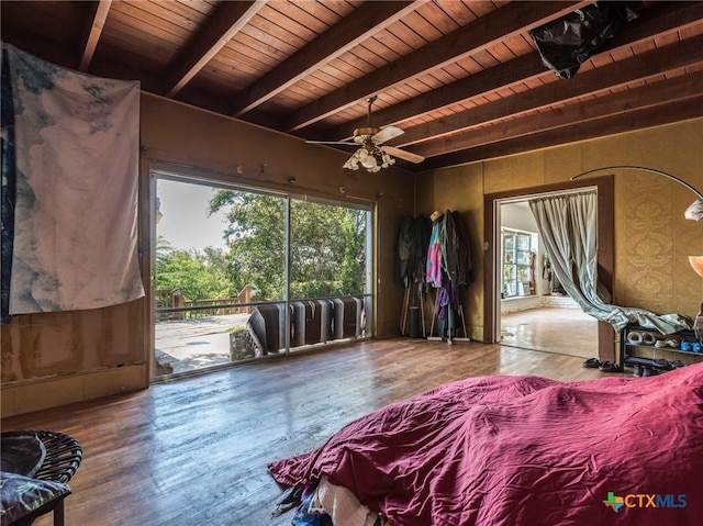 1000 Advance St, San Marcos, TX 78666 - bedroom with beam ceiling, wood finished floors, and wood ceiling