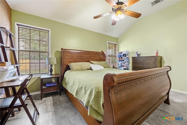 5404 Jim Ave, Killeen, TX 76549 - bedroom with baseboards, wood finished floors, lofted ceiling, and ceiling fan