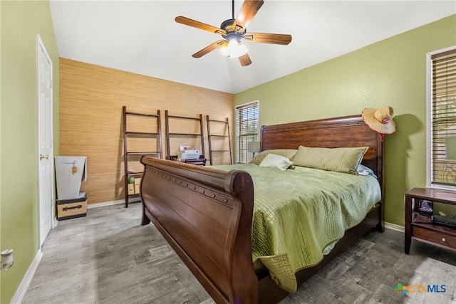 5404 Jim Ave, Killeen, TX 76549 - bedroom with baseboards, wood finished floors, and a ceiling fan