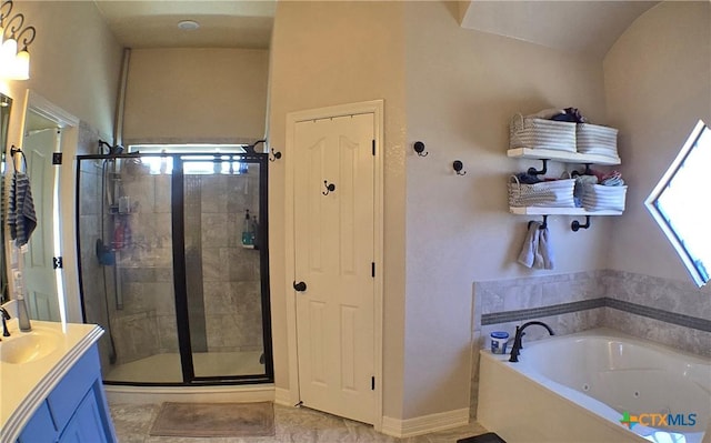 1122 Windy Hill Rd, Harker Heights, TX 76548 - bathroom featuring a shower stall, vanity, and a jetted tub