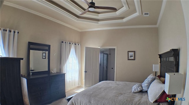 1122 Windy Hill Rd, Harker Heights, TX 76548 - carpeted bedroom featuring a tray ceiling, crown molding, and a ceiling fan