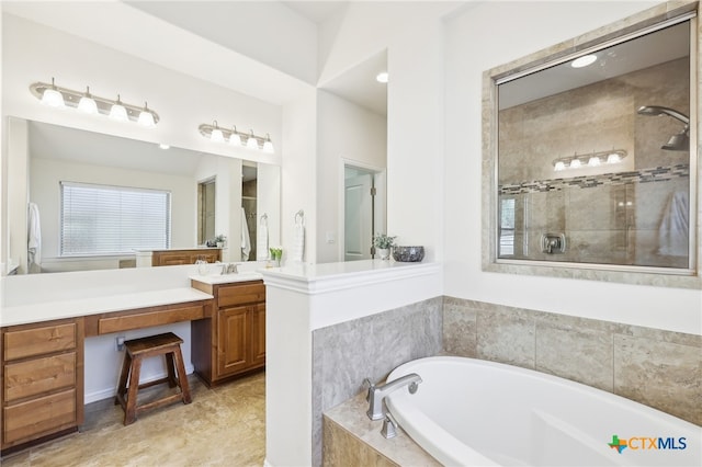 bathroom with tiled shower, a garden tub, vanity, and tile patterned flooring