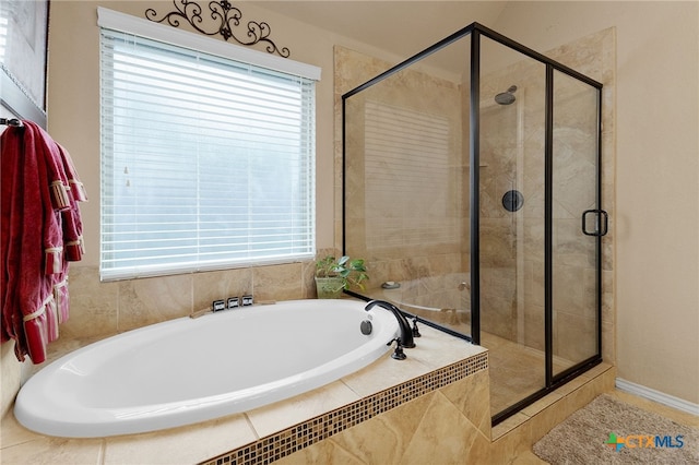 2194 Pioneer Pass, Seguin, TX 78155 - bathroom with a bath, a stall shower, and plenty of natural light