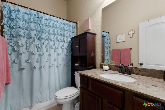 2194 Pioneer Pass, Seguin, TX 78155 - bathroom with vanity and a textured wall