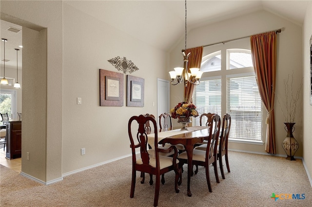 2194 Pioneer Pass, Seguin, TX 78155 - dining space with vaulted ceiling, a chandelier, and light colored carpet