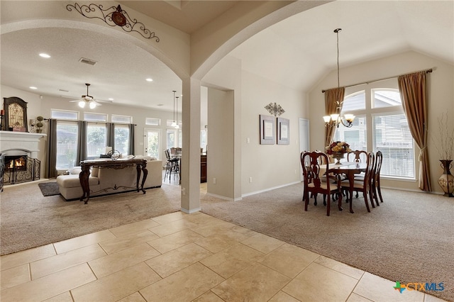 2194 Pioneer Pass, Seguin, TX 78155 - dining area featuring light carpet, plenty of natural light, arched walkways, a chandelier, and recessed lighting