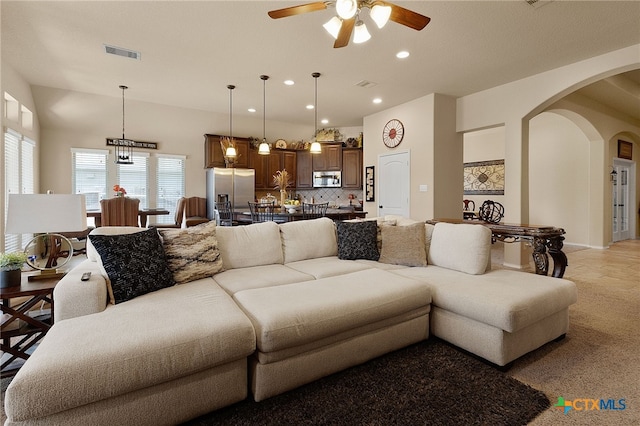 2194 Pioneer Pass, Seguin, TX 78155 - living room featuring arched walkways, a ceiling fan, and recessed lighting