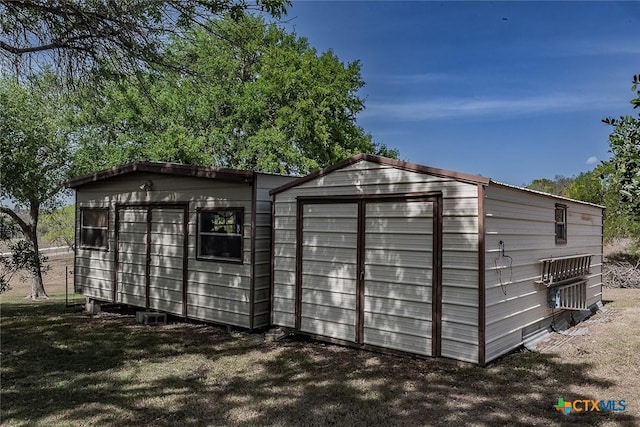 view of outbuilding with an outbuilding