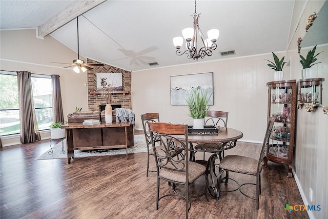 dining space featuring vaulted ceiling with beams, visible vents, ceiling fan with notable chandelier, and wood finished floors