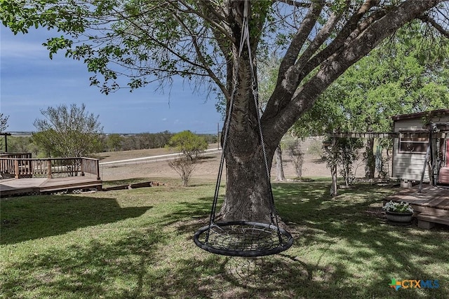 view of yard with a deck