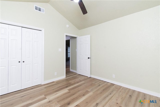 3918 Trinity Dr, Temple, TX 76504 - unfurnished bedroom featuring wood finished floors, a closet, baseboards, a ceiling fan, and high vaulted ceiling