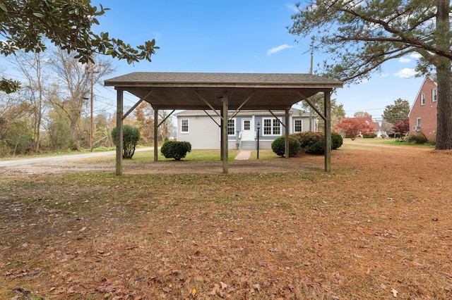 view of yard with a carport