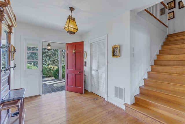 foyer with light wood-type flooring