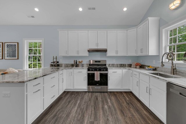 250 Pocahontas Ave, Deltaville, VA 23043 - kitchen featuring stainless steel appliances, a sink, under cabinet range hood, a peninsula, and white cabinets
