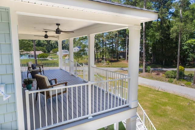 250 Pocahontas Ave, Deltaville, VA 23043 - porch with ceiling fan and view of scattered trees