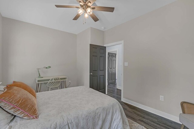 250 Pocahontas Ave, Deltaville, VA 23043 - bedroom with dark wood finished floors, baseboards, and a ceiling fan