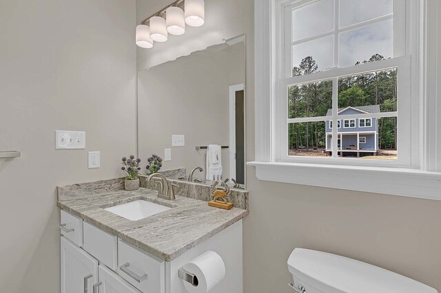 250 Pocahontas Ave, Deltaville, VA 23043 - half bath featuring vanity and toilet