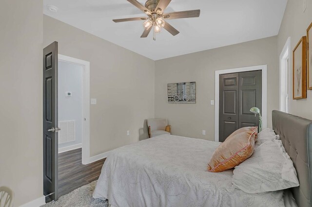 250 Pocahontas Ave, Deltaville, VA 23043 - bedroom with wood finished floors, baseboards, and a ceiling fan