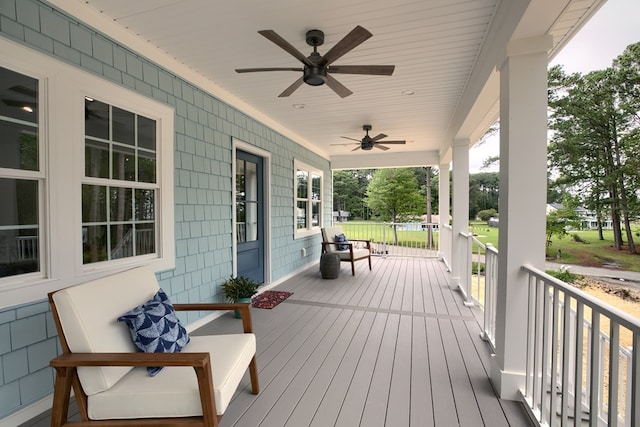 250 Pocahontas Ave, Deltaville, VA 23043 - wooden porch with ceiling fan