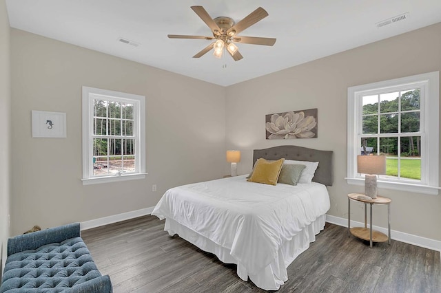 250 Pocahontas Ave, Deltaville, VA 23043 - bedroom with wood finished floors, baseboards, and ceiling fan