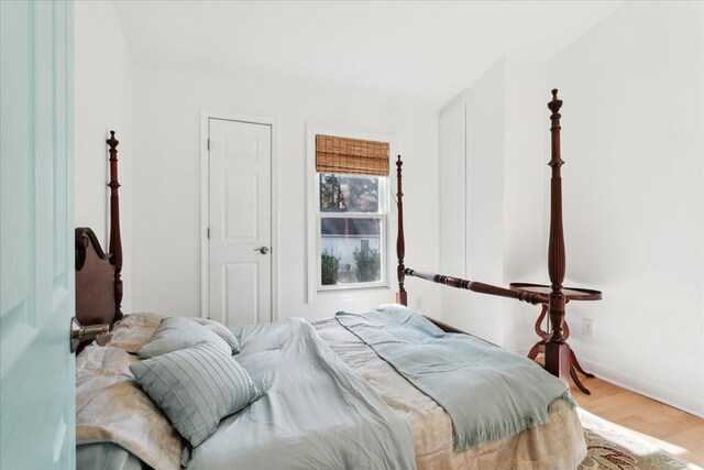 bedroom featuring wood finished floors