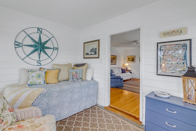 131 Henry Creek Ln, Kilmarnock, VA 22482 - bedroom featuring wood finished floors, crown molding, and wood walls