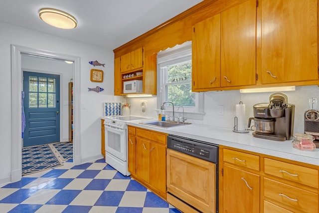 131 Henry Creek Ln, Kilmarnock, VA 22482 - kitchen featuring white appliances, a sink, light floors, light countertops, and baseboards
