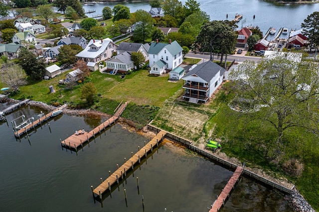 aerial view with a water view and a residential view