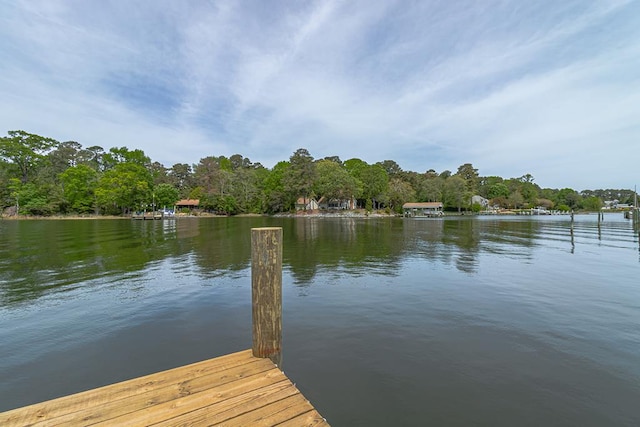 view of dock with a water view