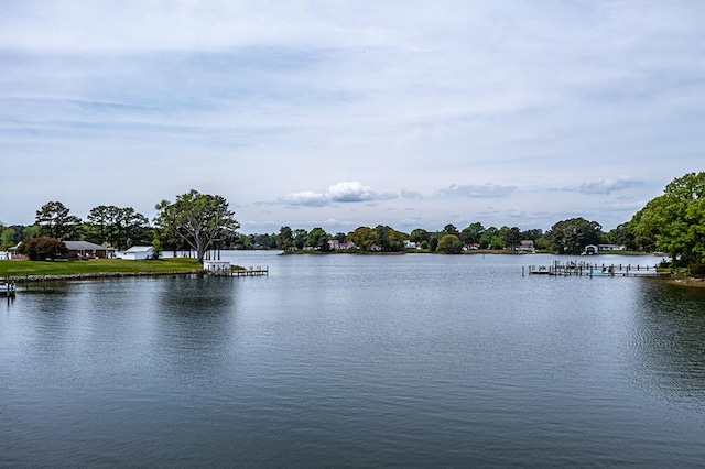 property view of water featuring a boat dock