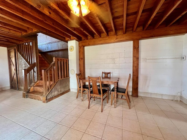59 Judith Sound Cir, Lottsburg, VA 22511 - dining room with light tile patterned flooring, stairs, and concrete block wall